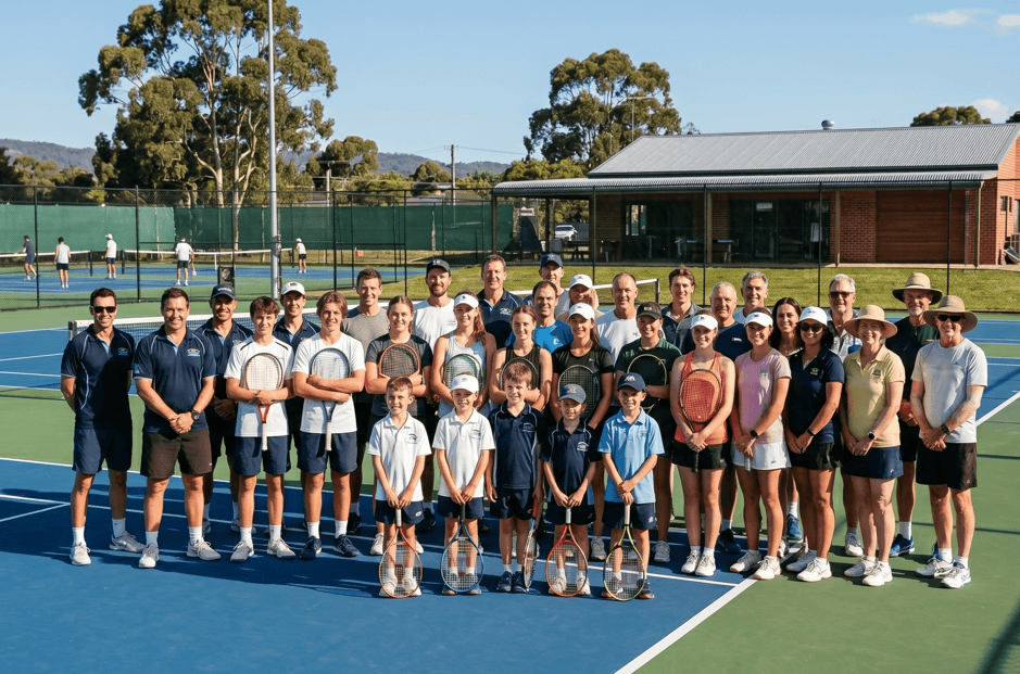 welcoming group photo of mixed-age players at Oxford Falls Racquet Club